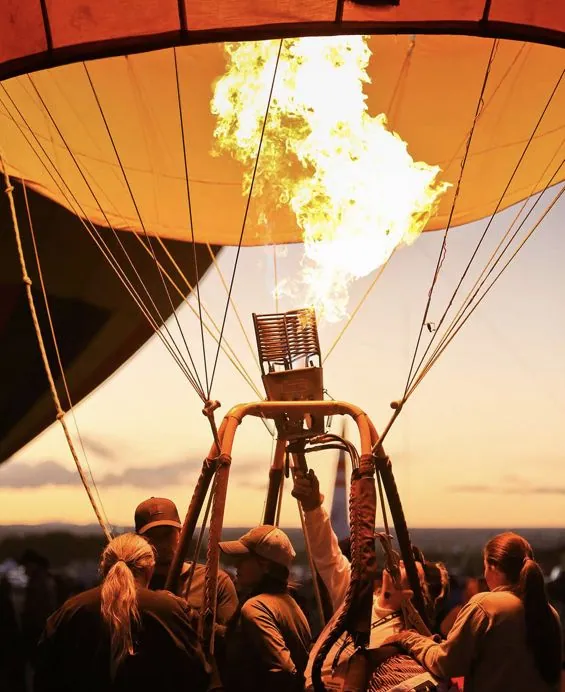 Traveler enjoying a hot air balloon ride over Teotihuacán